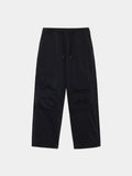 Alpha Industries Oversized Washed Pant in black, elastic waistband, drawstring, large knee patch pockets, 100% cotton.