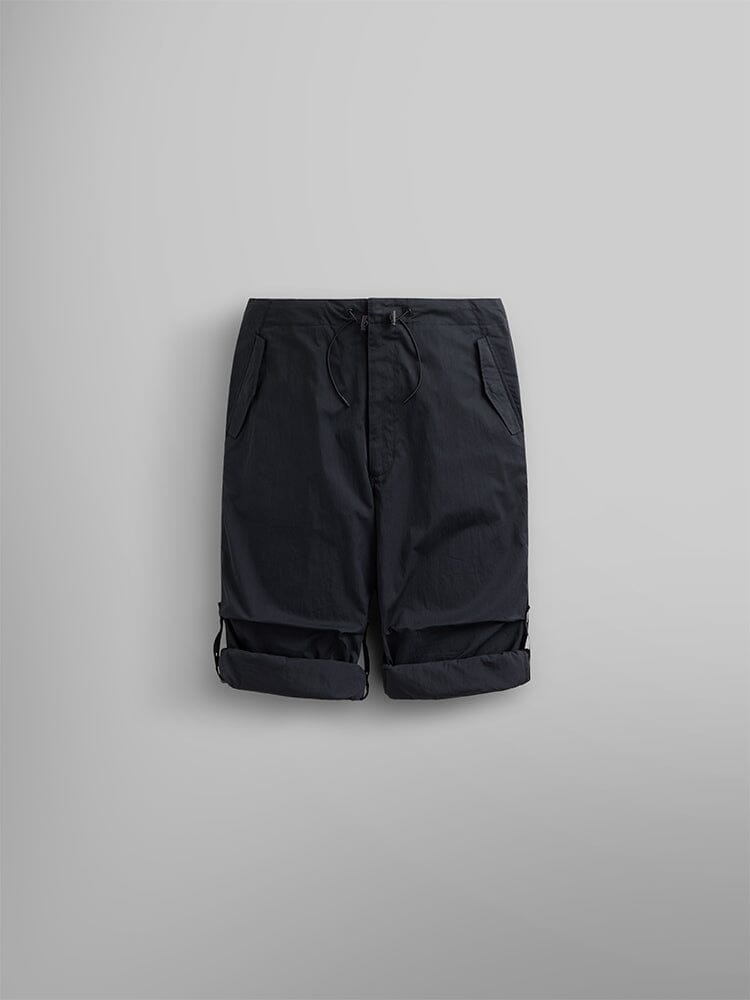 Alpha Industries Lightweight Parachute Pant in dark gray, knee-length shorts with side pockets, belt loops, button and zipper closure, nylon/cotton blend.