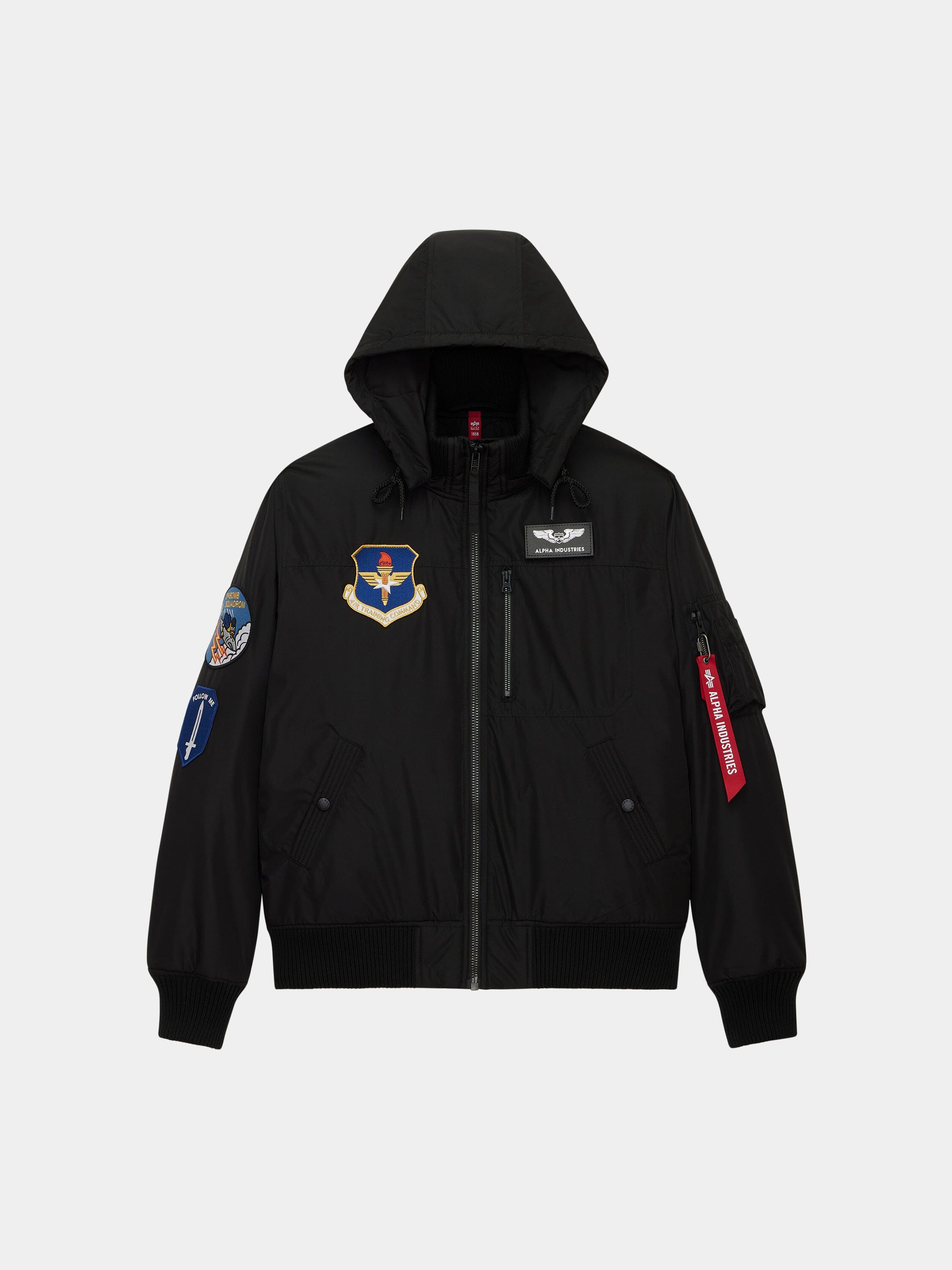 Patched Hooded Rib Flight Jacket by Alpha Industries in black with front zipper, patches, ribbed cuffs and hem, utility pocket.