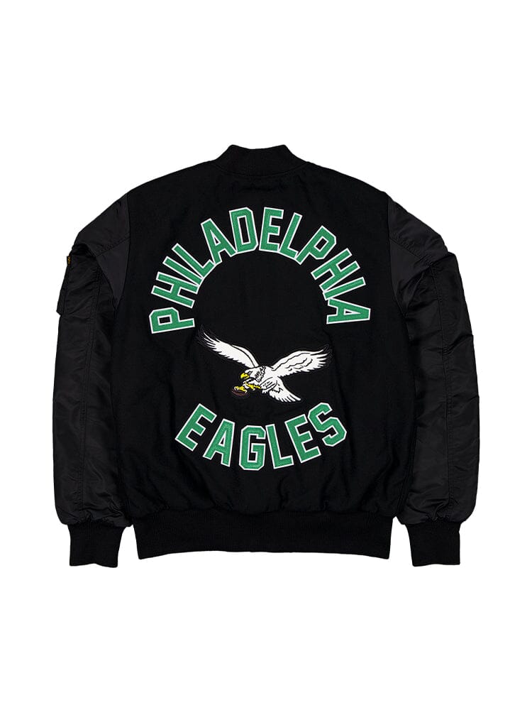 Philadelphia Eagles MA-1 Bomber Jacket by Alpha Industries featuring Philadelphia Eagles text and eagle graphic on back, NFL bomber style, model FW24-NE-NFL.
