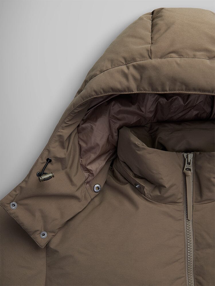 Alpha Industries Puffer Parka, khaki, water-resistant with hood, zipper, snap buttons, and adjustable drawstring.