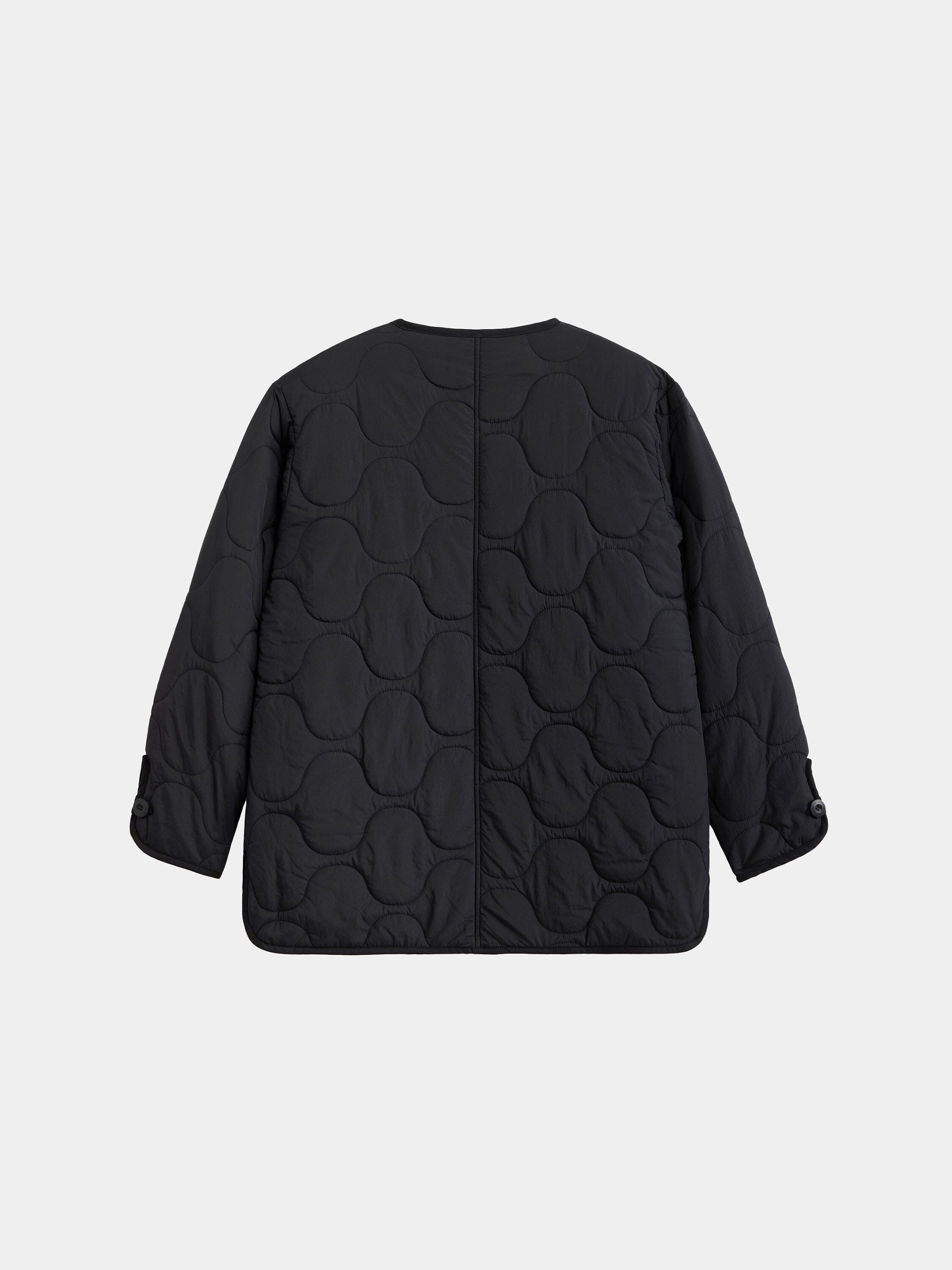 Alpha Industries Reversible Als/92 Mod Liner Womens black quilted nylon ripstop jacket with circular stitching, long sleeves, buttoned cuffs.