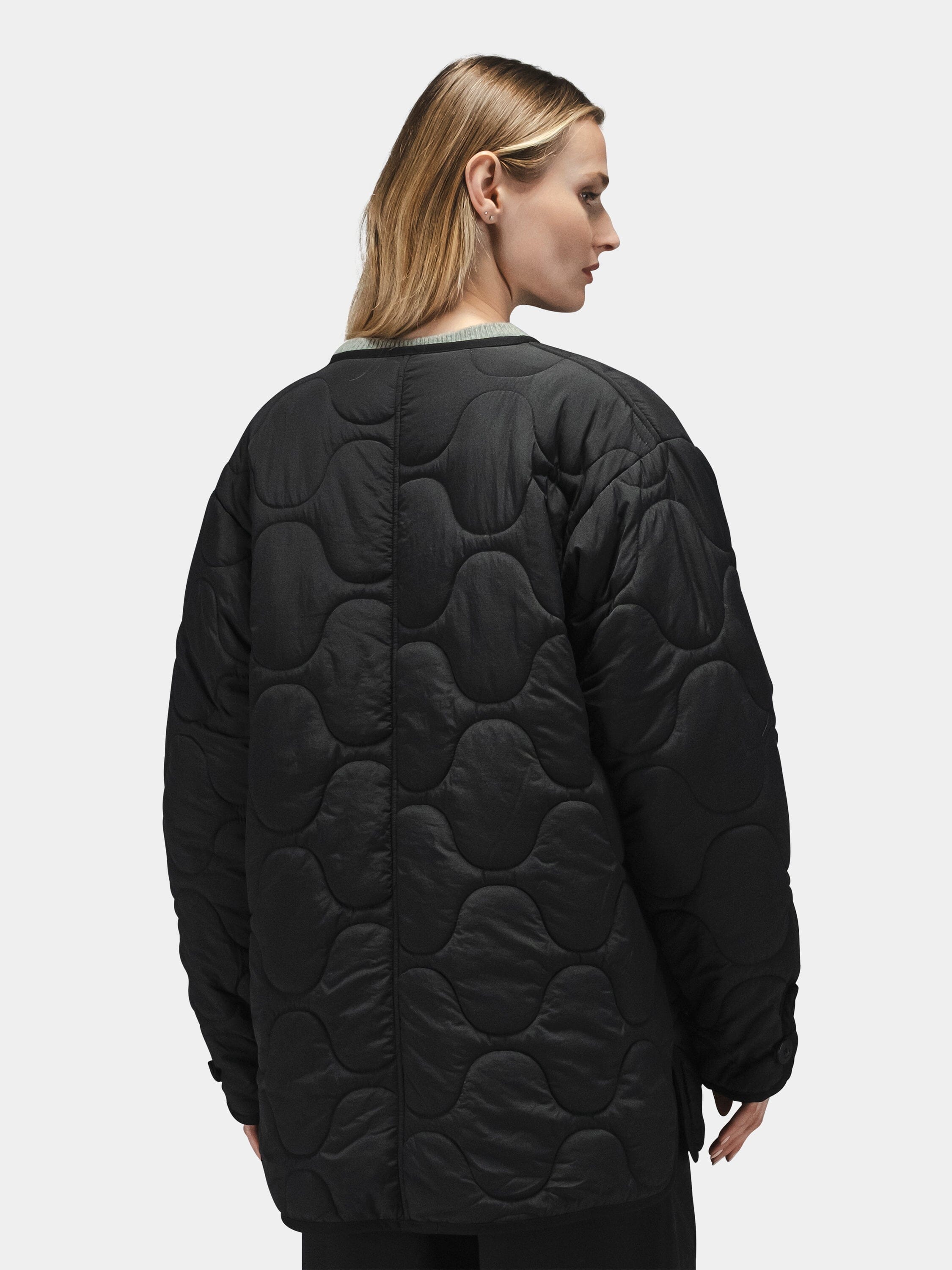 Alpha Industries Reversible Als/92 Mod Liner Womens, black quilted nylon ripstop jacket with wavy pattern.