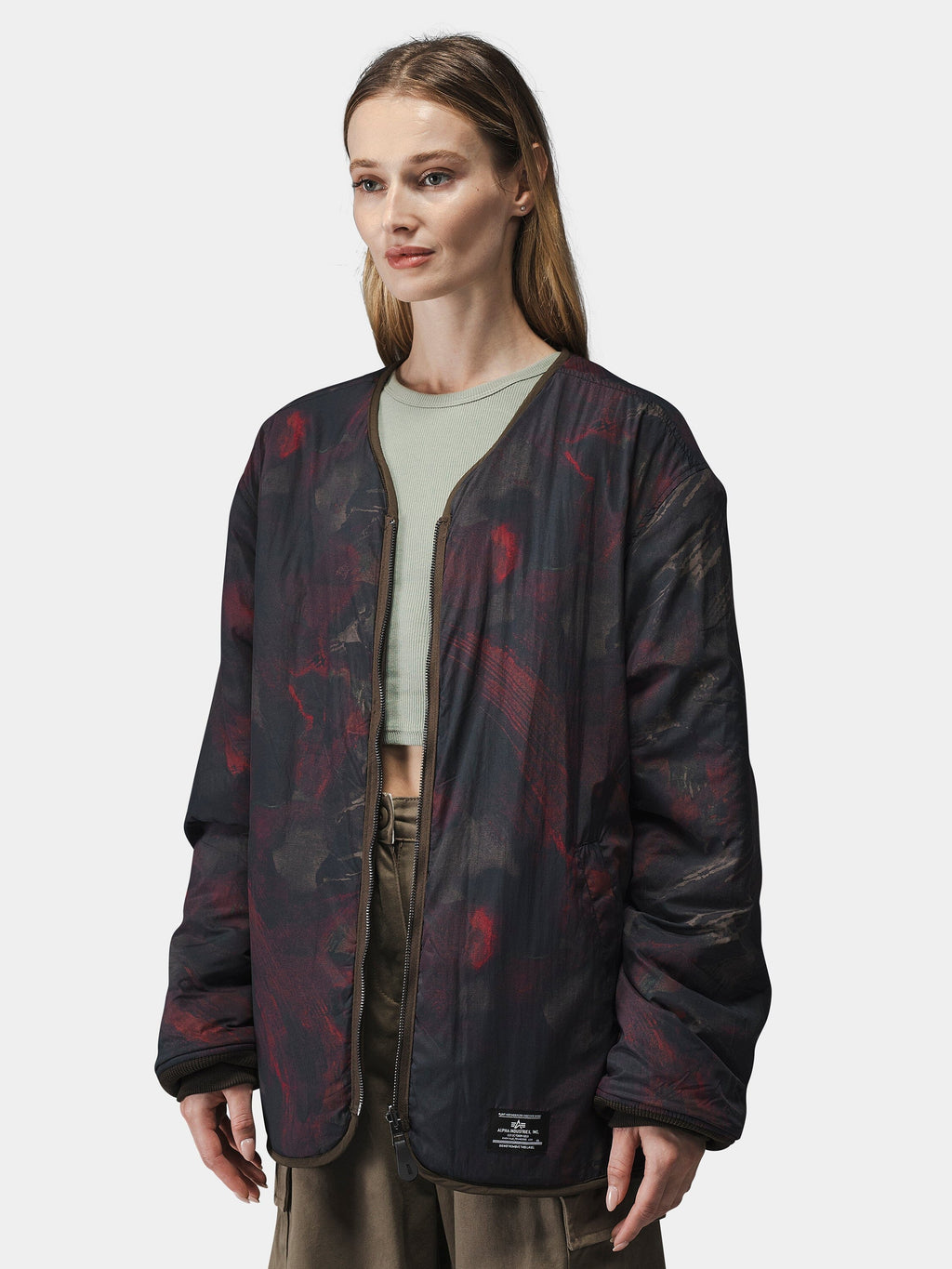Alpha Industries Reversible M-65 Quilted Liner, dark camo pattern, quilted design.