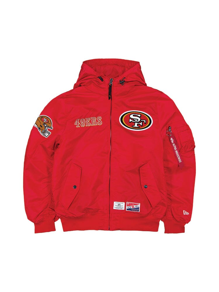 Experience the San Francisco 49ers X Alpha X New Era L-2B Bomber Jacket by Alpha Industries, showcasing San Francisco 49ers logos and team patches on the front and sleeves in a vibrant Speed Red color.