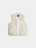Alpha Industries Sherpa Onion Quilting Vest in Dune White with cream sleeveless onion-quilted shell, snap buttons, and three pockets.