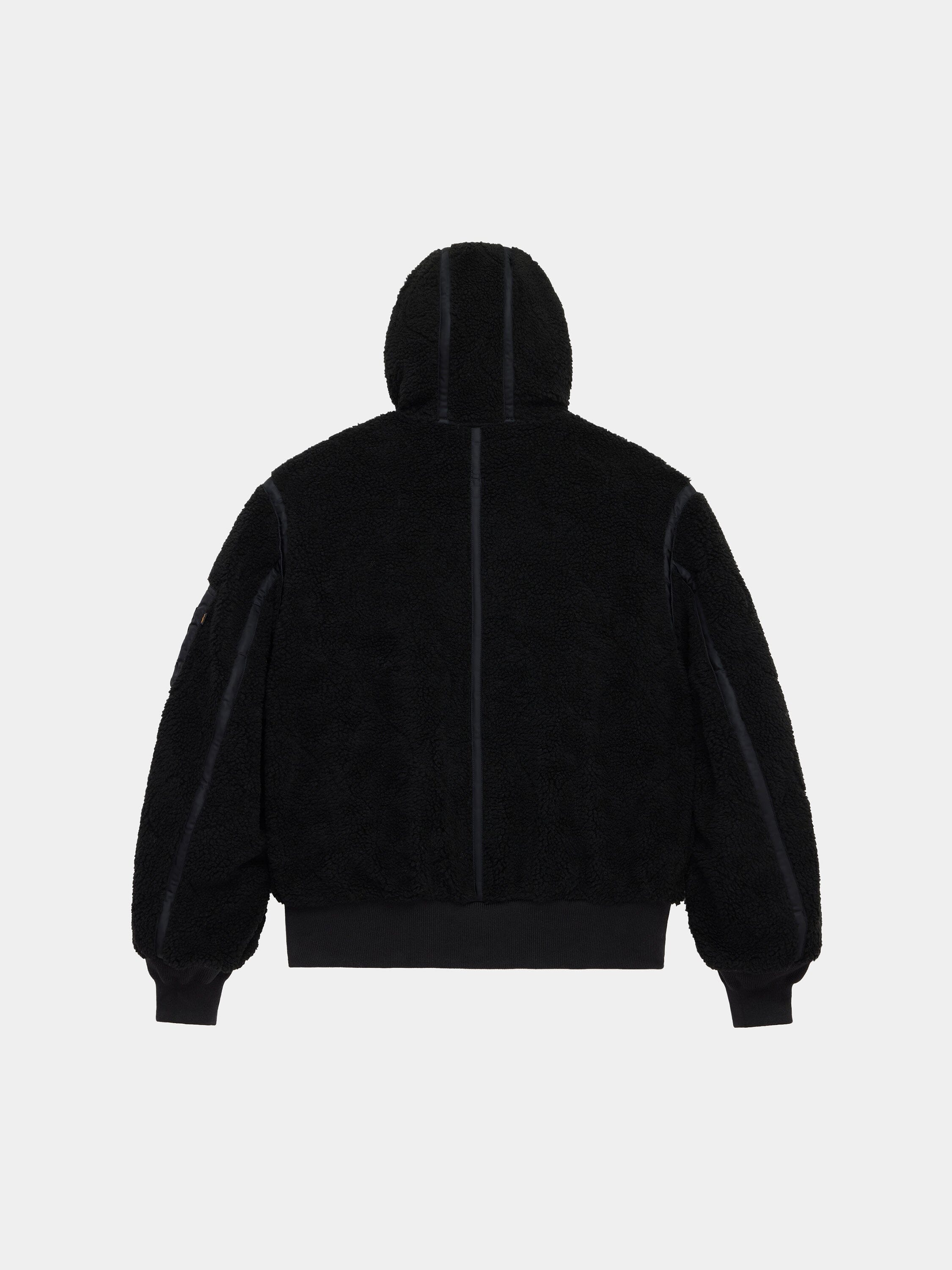 Alpha Industries Sherpa Onion Quilting Flight Jacket with black sherpa quilting, ribbed cuffs, and waistband.