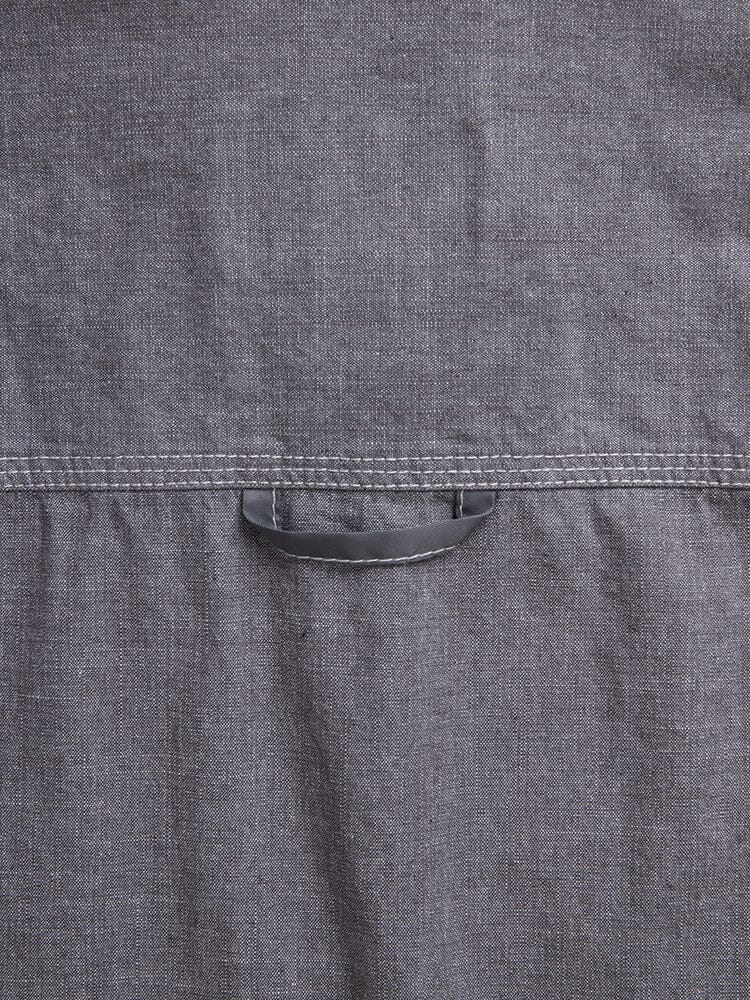 Alpha Industries Short Sleeve Multi Pocket Shirt, gray fabric with horizontal seam and small black loop.