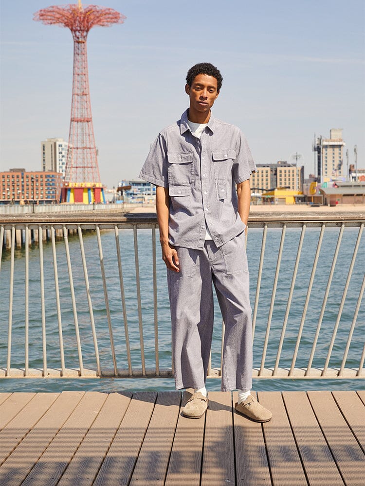 Alpha Industries Short Sleeve Multi Pocket Shirt, light gray, multiple pockets, button closure.