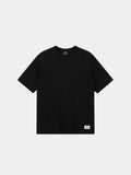 Alpha Industries Short Sleeve Relaxed Tee in black with crew neck, short sleeves, and small white label at the hem.
