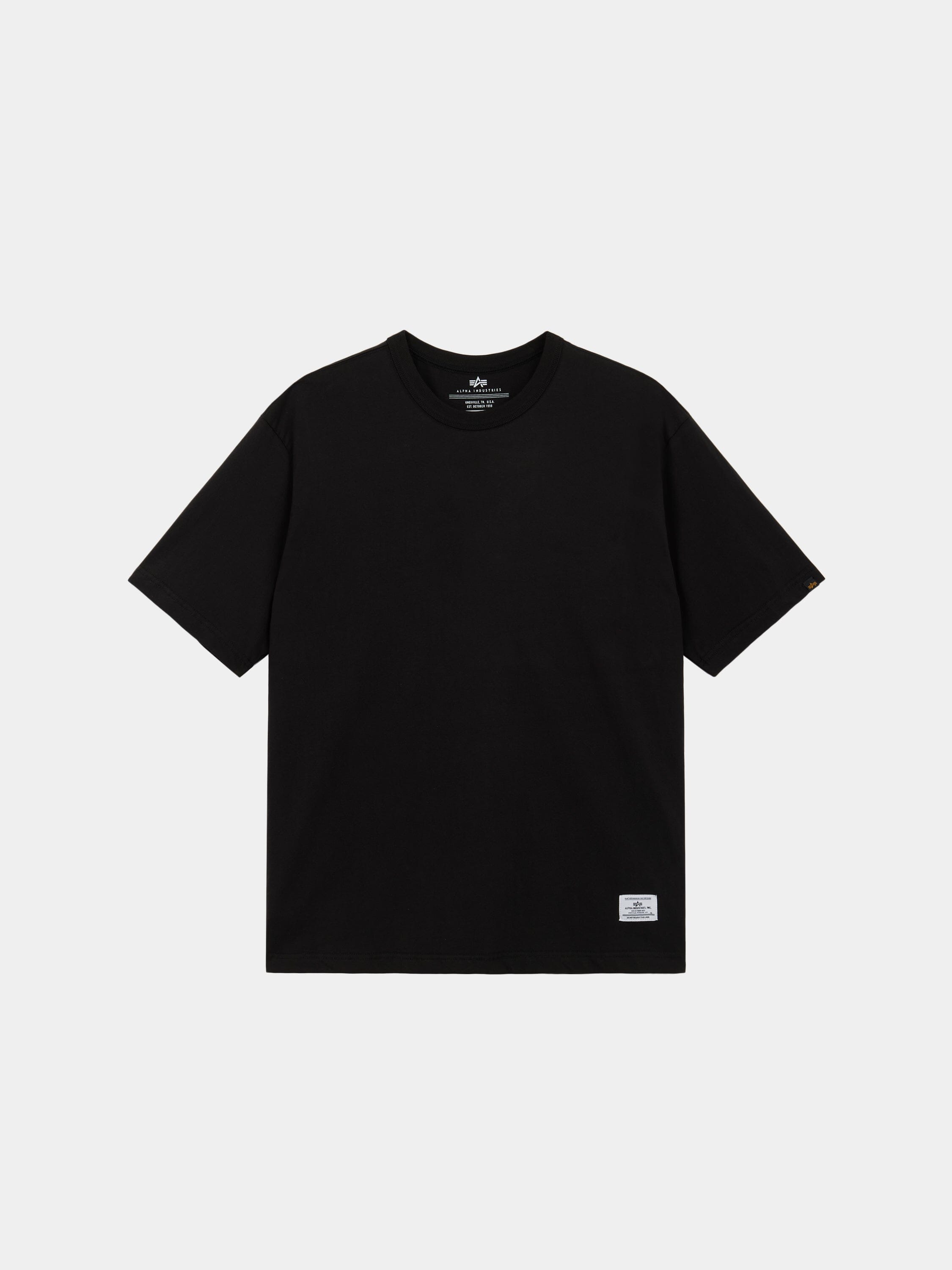 Alpha Industries Short Sleeve Patched Tee, black crewneck t-shirt with short sleeves and white rectangular label near the hem.