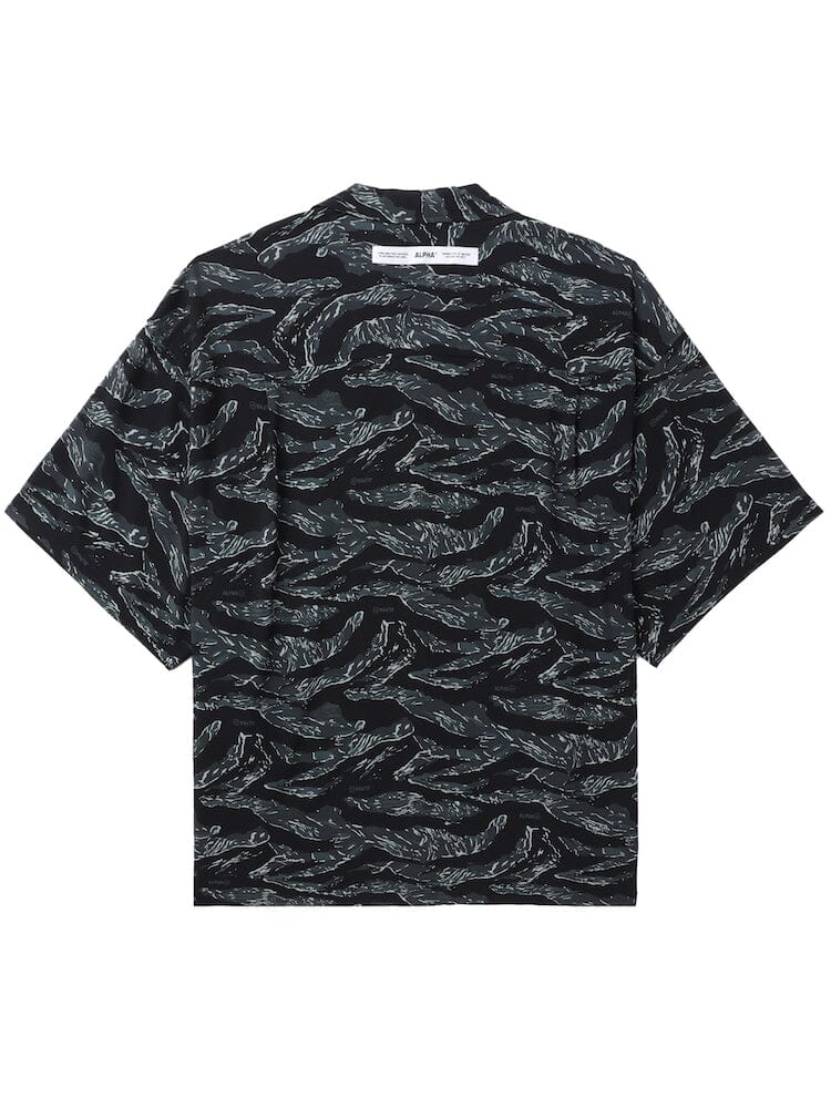 Unfrm Army Hawaii Shirt by Alpha Industries, black, loose-fit short-sleeve button-down with all-over abstract white wave pattern.