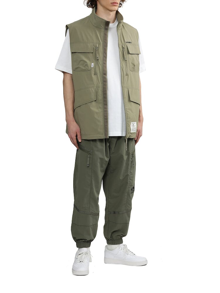 UNFRM Nylon Tactical Vest by Alpha Industries in olive green with utility pockets and zipper front.