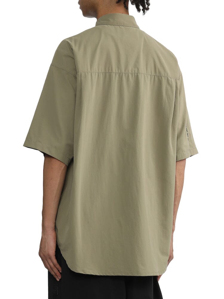 Alpha Industries Nylon Utility Shirt in Olive Green with Short Sleeves and Button Front Closures.