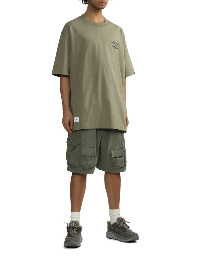Alpha Industries UNFRM Nylon Utility Short, olive green, drawstring waist, tactical pockets.