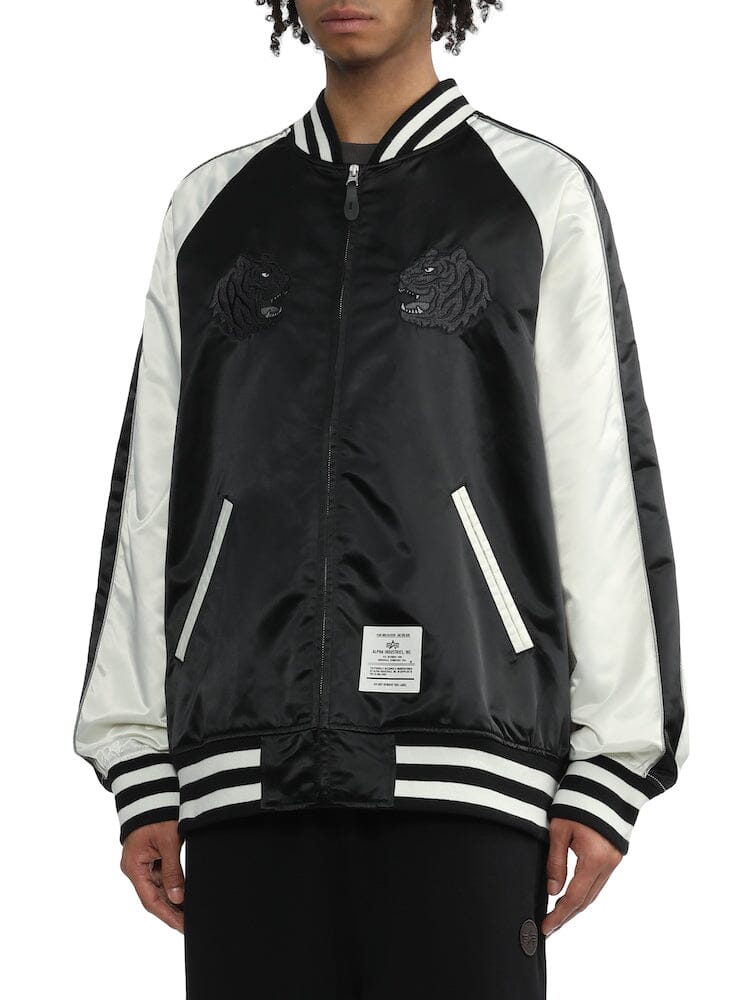 UNFRM Tiger Souvenir Jacket Alpha Industries, black and white satin, striped cuffs and collar, Alpha Tiger chest embroidery, angled front pockets.