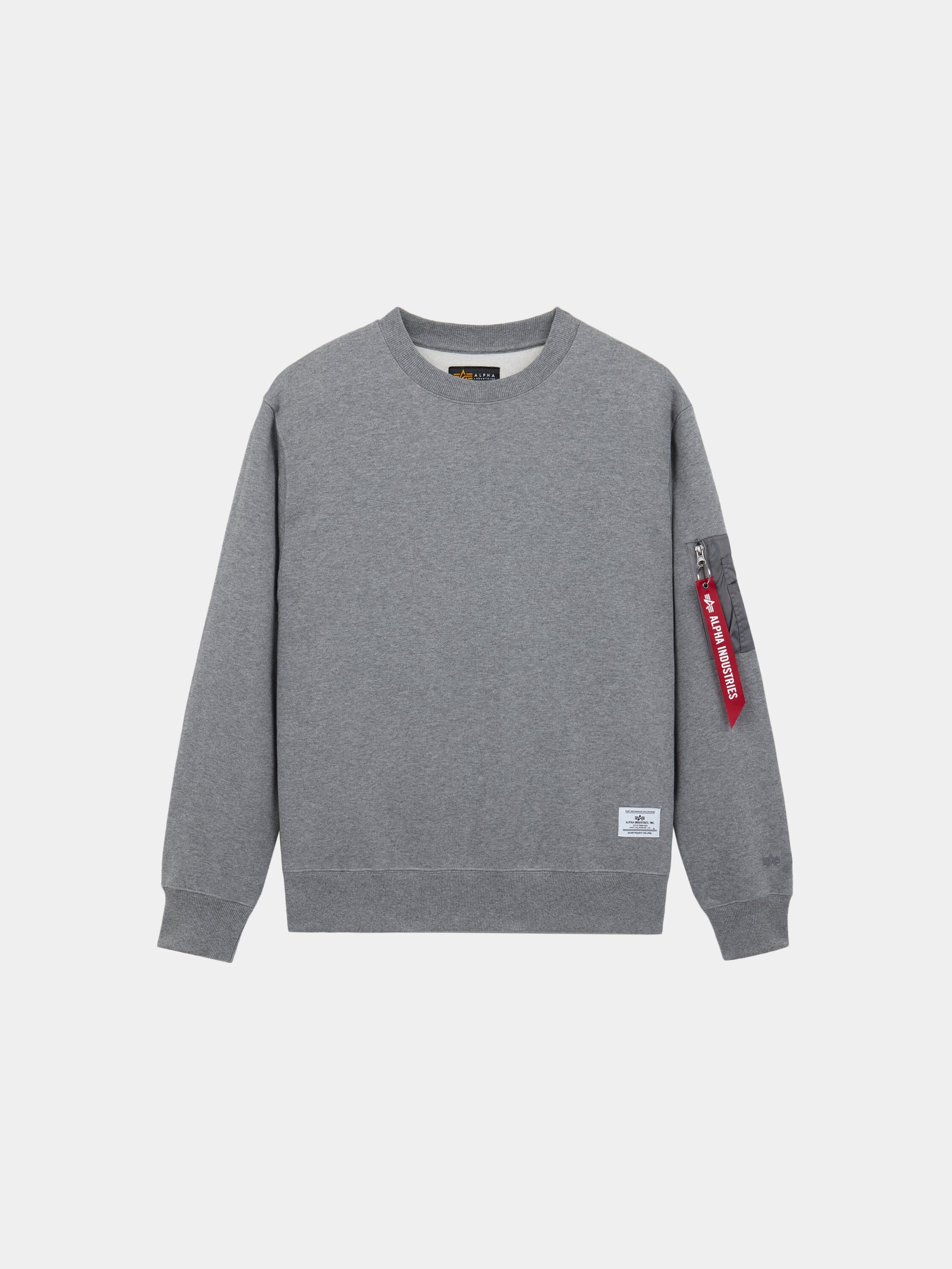 Alpha Industries Utility Pocket Crewneck in Medium Charcoal Heather with MA-1 utility pocket and red zip tag on left sleeve.