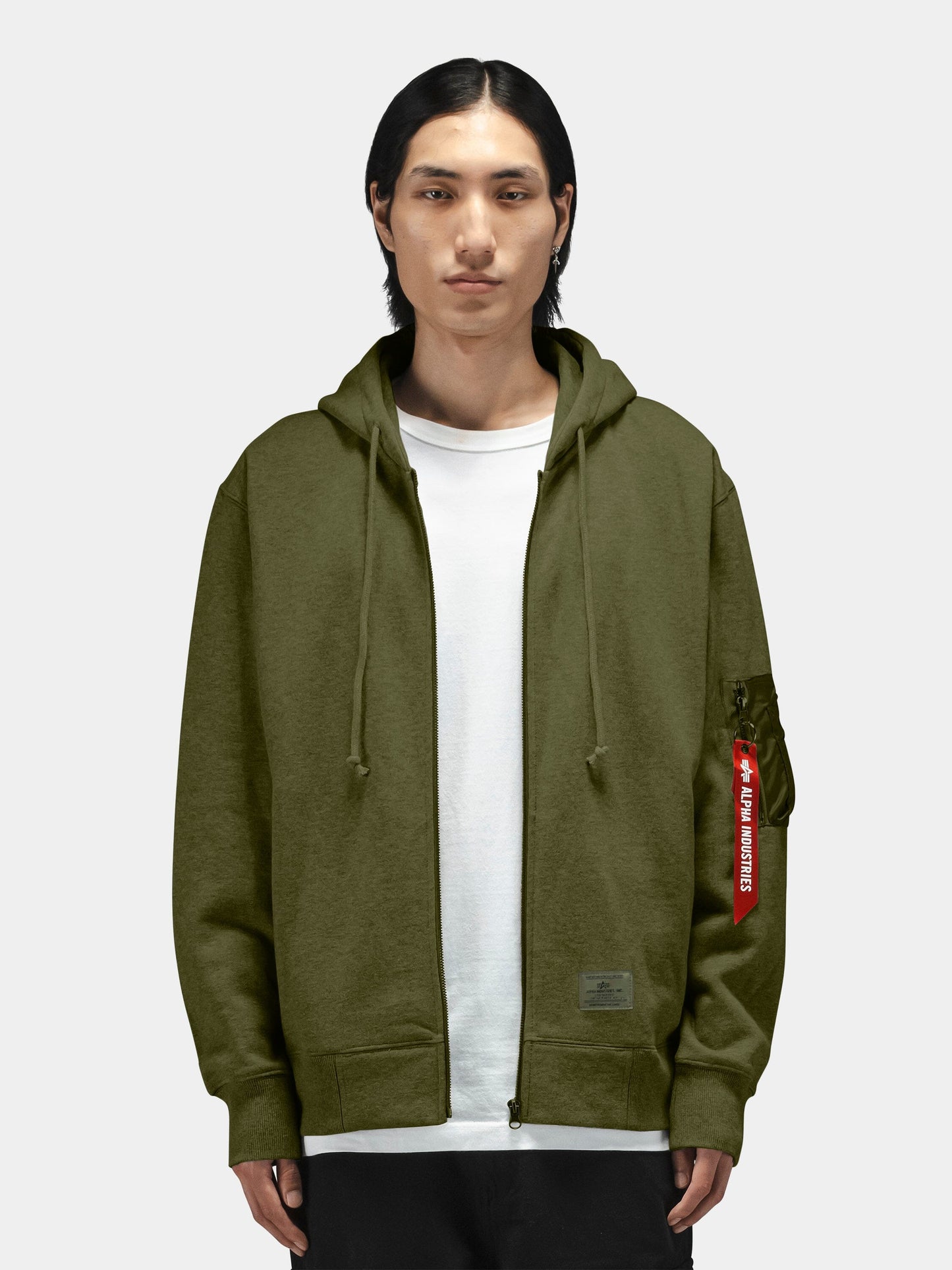 Alpha Industries Utility Pocket Full Zip Up in olive green with front zipper closure and utility pockets.