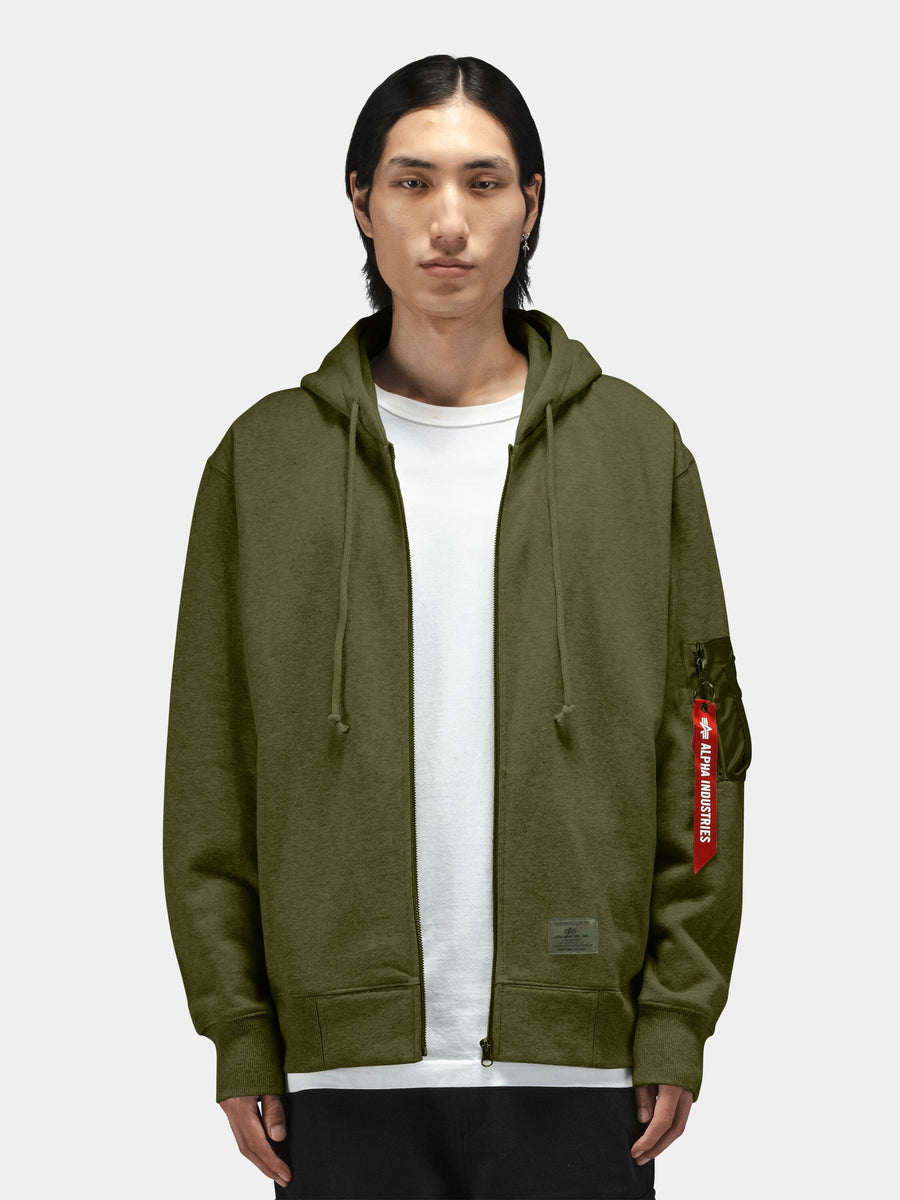 Alpha Industries Utility Pocket Full Zip Up in olive green with front zipper closure and utility pockets.