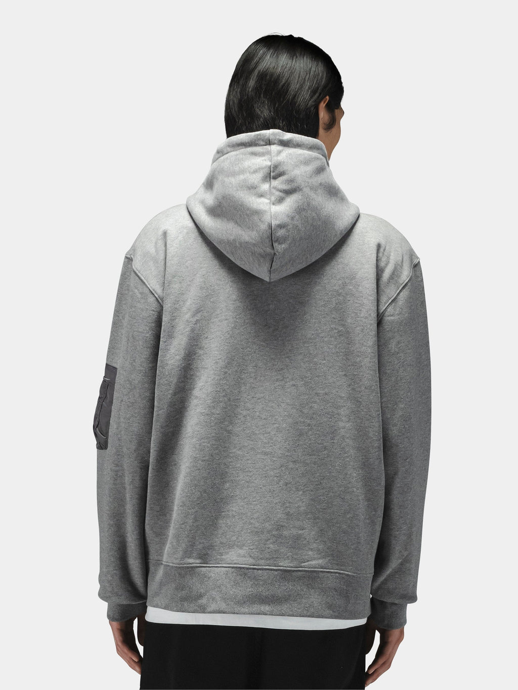 Alpha Industries Utility Pocket Full Zip Up hoodie in gray with a black patch on the left sleeve.