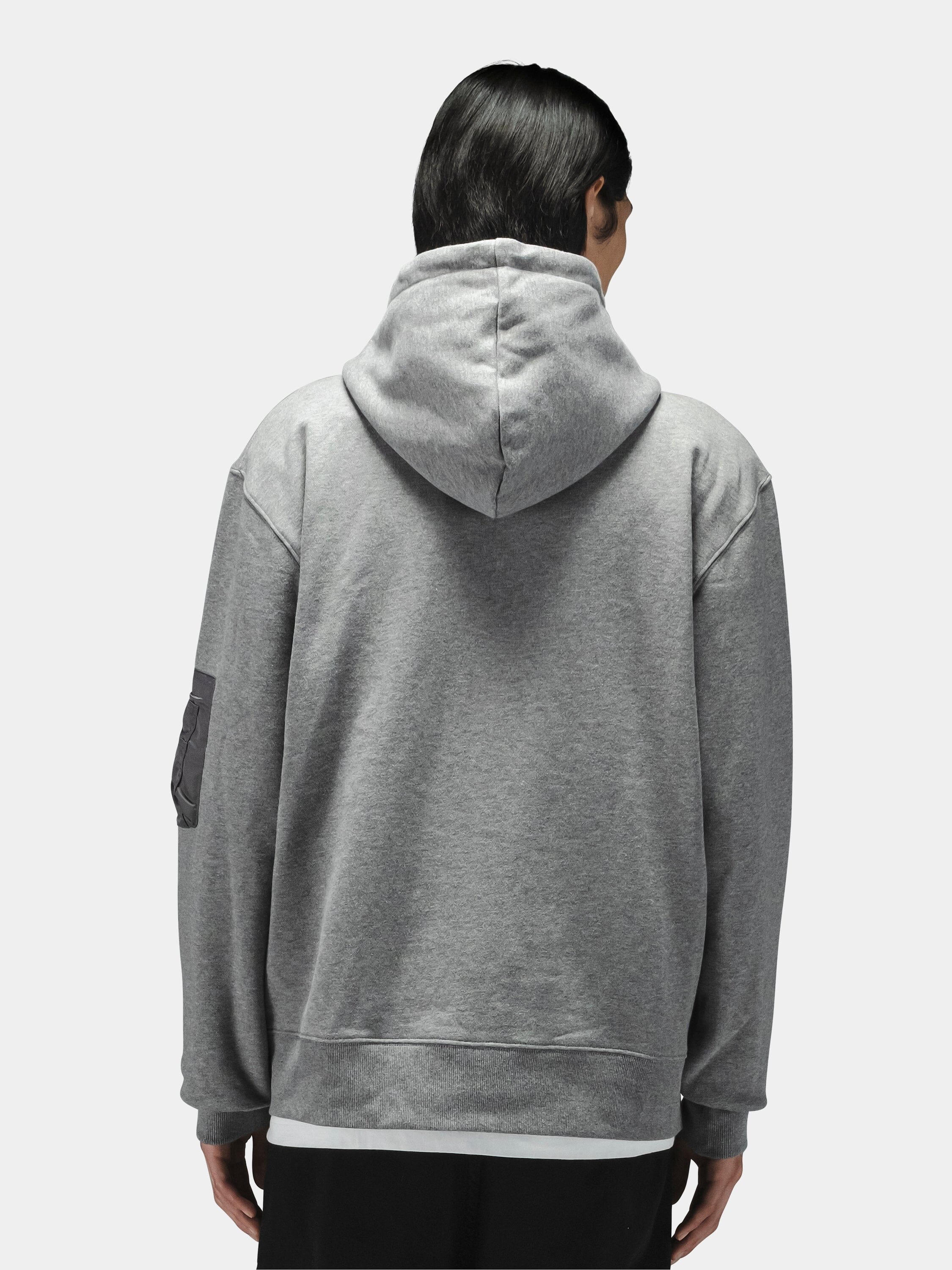 Alpha Industries Utility Pocket Full Zip Up hoodie in gray with a black patch on the left sleeve.