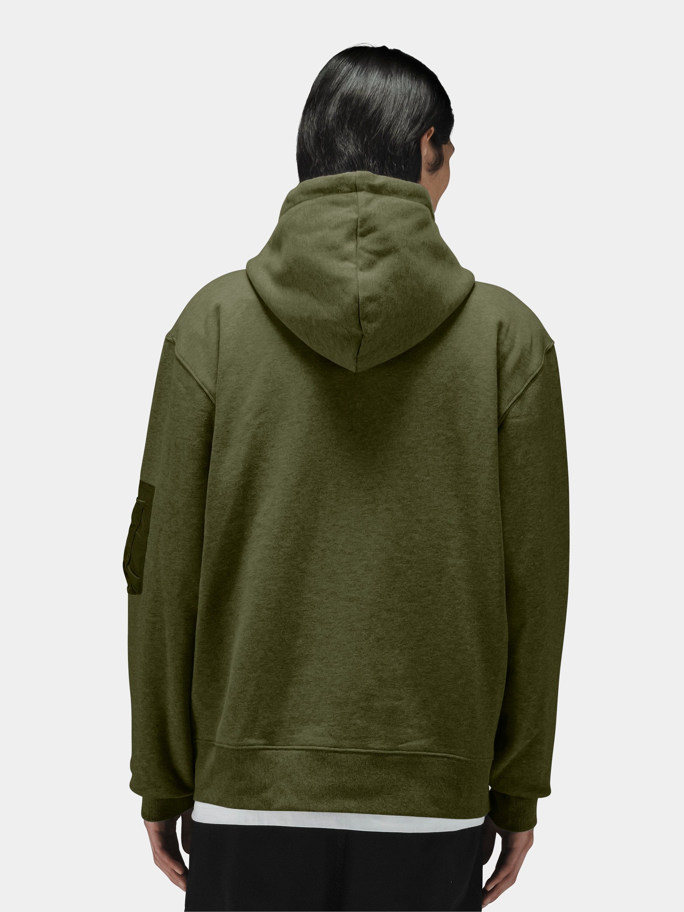 Alpha Industries Utility Pocket Full Zip Up hoodie in olive green with black pants.