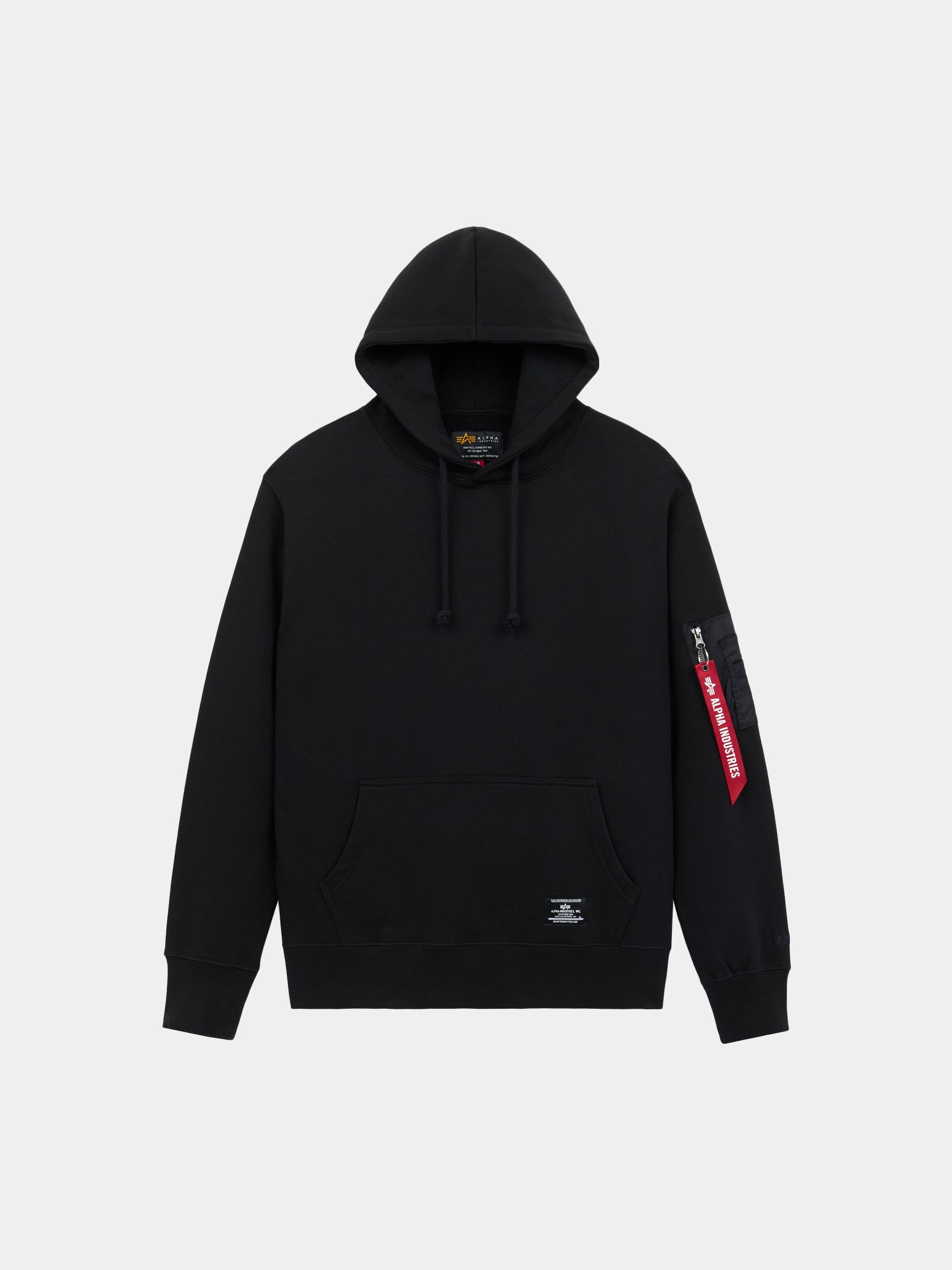 Alpha Industries Utility Pocket Hoodie in Black with front pocket and red tag on the MA-1 utility sleeve pocket.