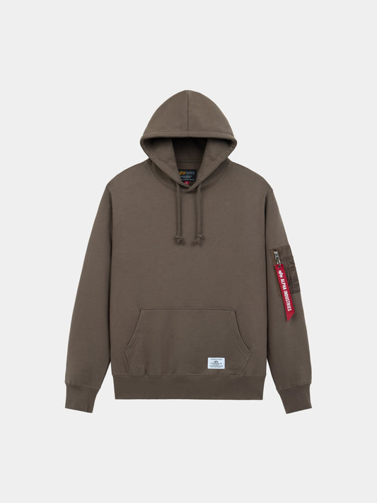 Alpha Industries Utility Pocket Hoodie in espresso with front pocket, drawstrings, red tag on left sleeve, and MA-1 utility pocket.