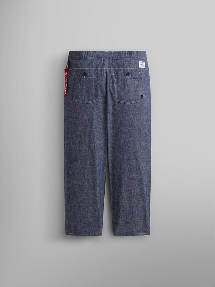Alpha Industries Wide Leg Cotton Trouser in blue denim with two rear pockets and a red fabric tag on the left side.