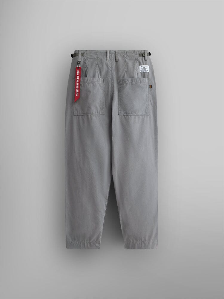 Alpha Industries Womens Barrel Leg Pants in aircraft gray with two large back pockets, red tag on belt loop, and white label above right pocket.
