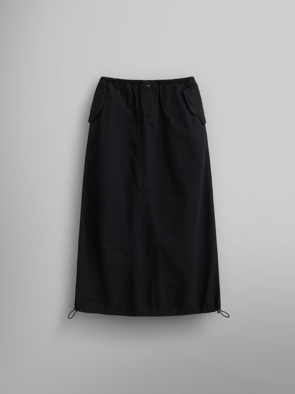 The Women's Drawcord Skirt by Alpha Industries features a black mid-length design with a drawstring hem and bungee waistband.