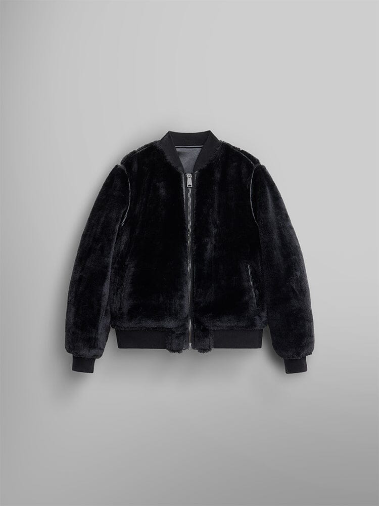 The reversible side of the Women's Reversible Faux Leather MA-1 Bomber Jacket by Alpha Industries, featuring a stylish black faux fur design with a front zipper and ribbed cuffs and hem.