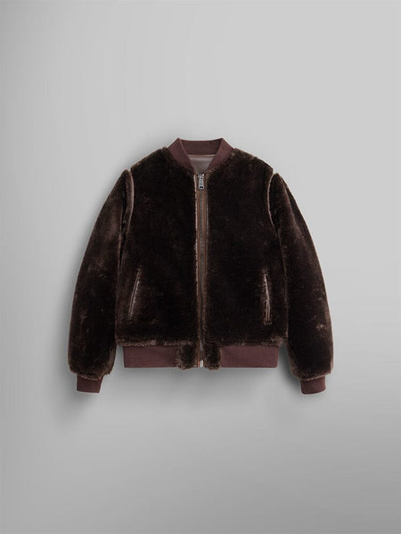 The reversible view of the Women's Reversible Faux Leather MA-1 Bomber Jacket by Alpha Industries is a brown faux fur bomber with shearling accents, featuring a front zipper and ribbed cuffs, collar, and hem.