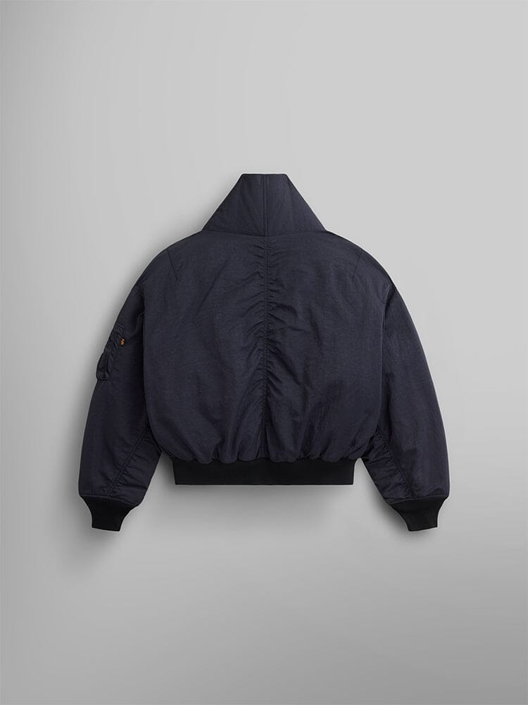 Back view of the Women's Shawl Collar Bomber Jacket in black by Alpha Industries, showcases its ribbed waistband and cuffs.