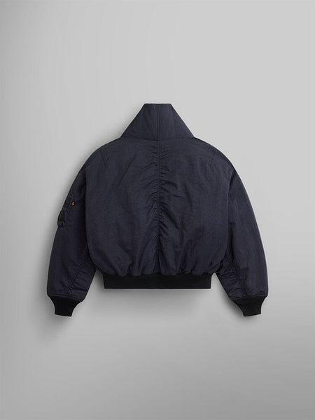 Back view of the Women's Shawl Collar Bomber Jacket in black by Alpha Industries, showcases its ribbed waistband and cuffs.