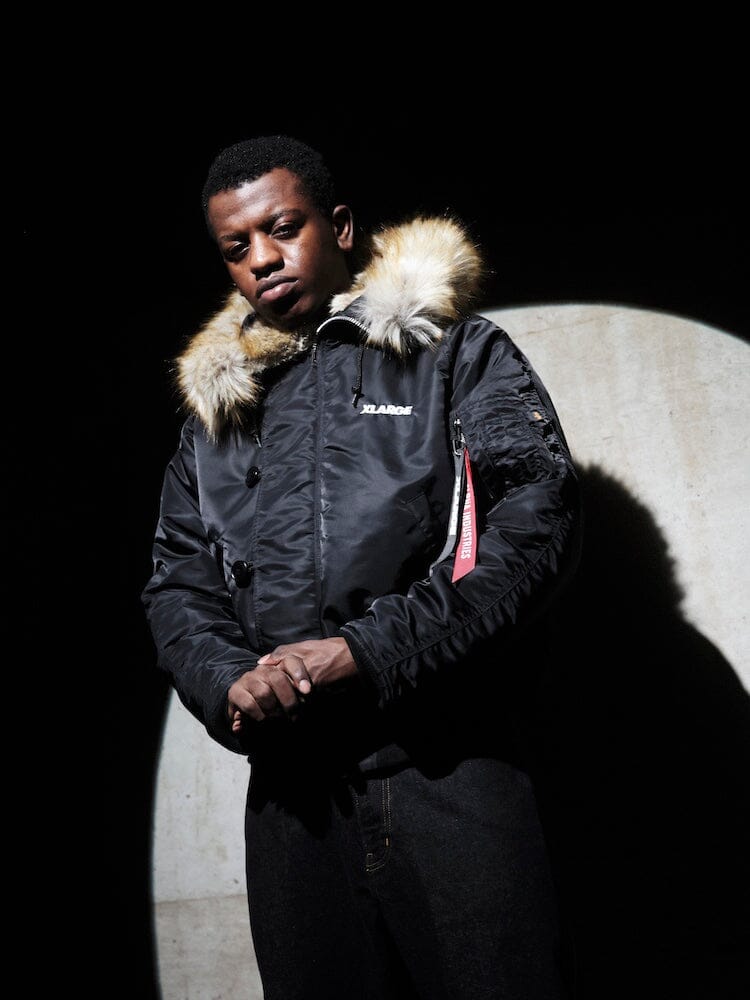 Alpha Industries N-2B Core Spec Parka, black, synthetic mouton fur-lined hood.