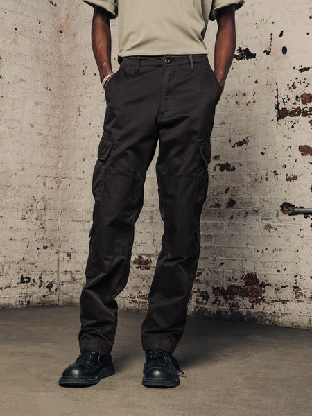 Alpha Industries Acu Pant cargo pants, utility pockets, black color, button and zipper closure.
