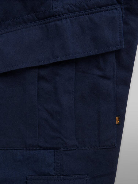Alpha Industries Acu Pant, dark blue, large utility pocket with flap, nylon knee patches, small gold tag on seam.