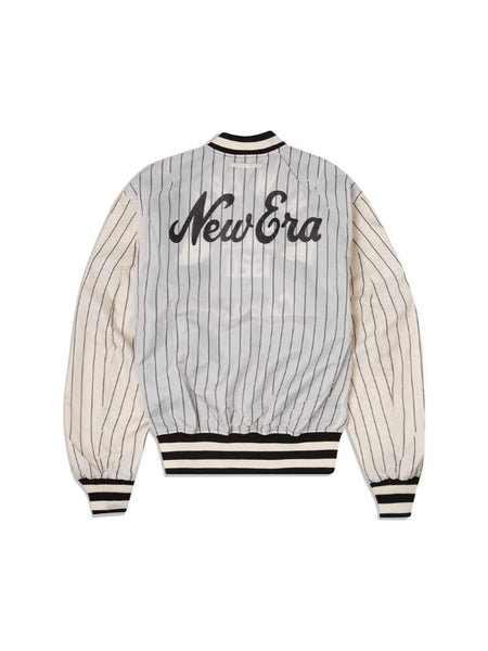 Introducing the Alpha X New Era L-2B Bomber Jacket by Alpha Industries: a stylish bomber jacket with a striped design and "New Era" text emblazoned on the back, showcasing a timeless black and white color palette. It features ribbed cuffs and a snug waistband for added comfort.