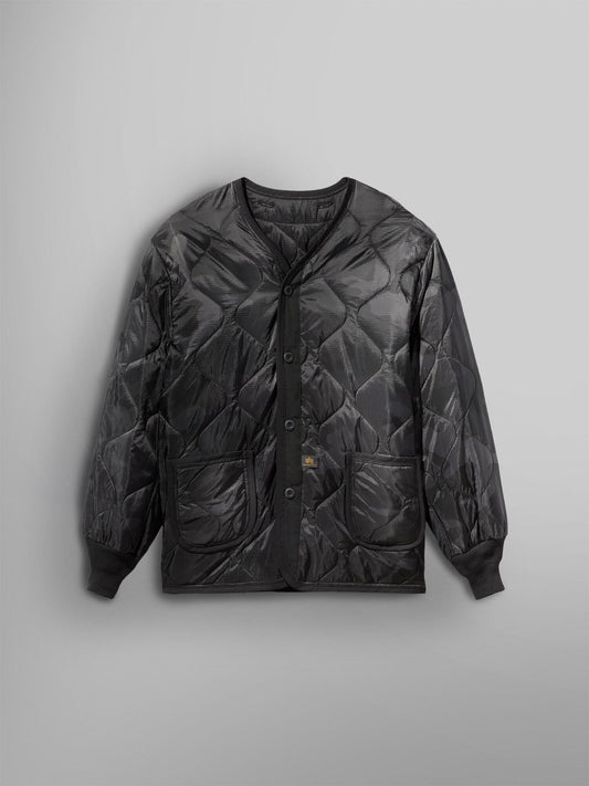 Alpha Industries ALS/92 Liner in Black Woodland Camo, quilted design, two front pockets, ribbed cuffs.