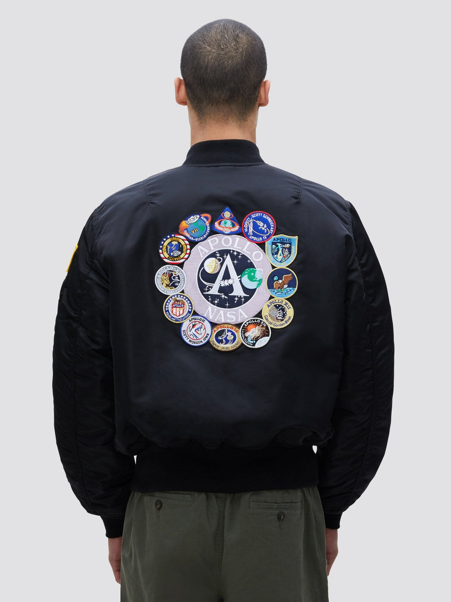 Alpha Industries Ma-1 Bomber Jacket, black, nylon, Apollo mission patches in a circle on back.