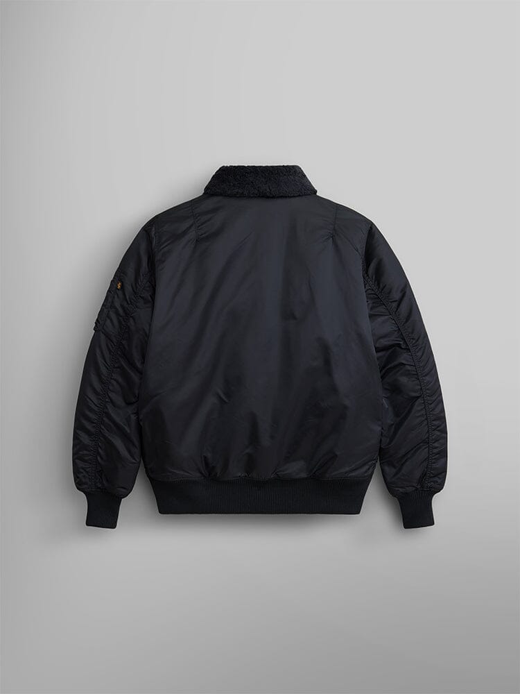 Alpha Industries B-15 Mod Bomber Jacket in black with faux mouton collar, ribbed cuffs, and waistband.