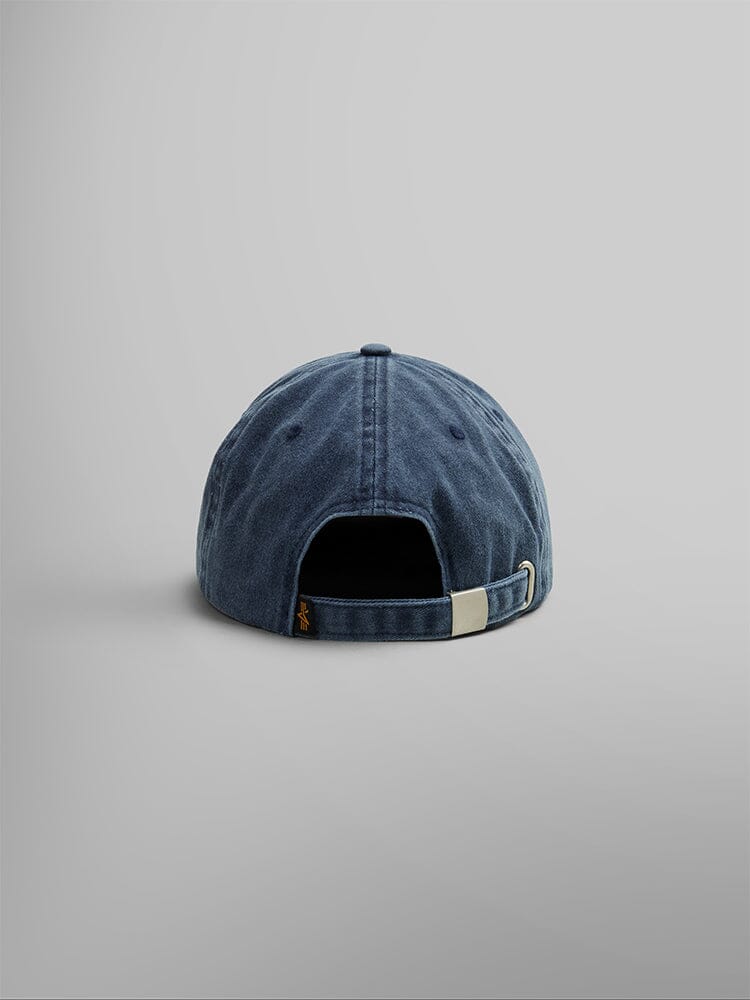 The Battlewash Cap from Alpha Industries features a vintage-inspired design with an adjustable strap and a metal buckle, as seen from the back.