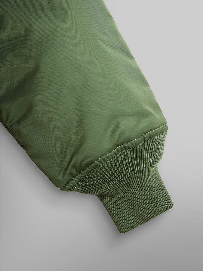 Alpha Industries CWU 45/P Bomber Jacket in green with ribbed knit cuff.