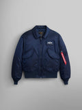 Alpha Industries Cwu 45/P Bomber Jacket in navy with front zipper, two flap pockets, chest patch, and red sleeve tag.
