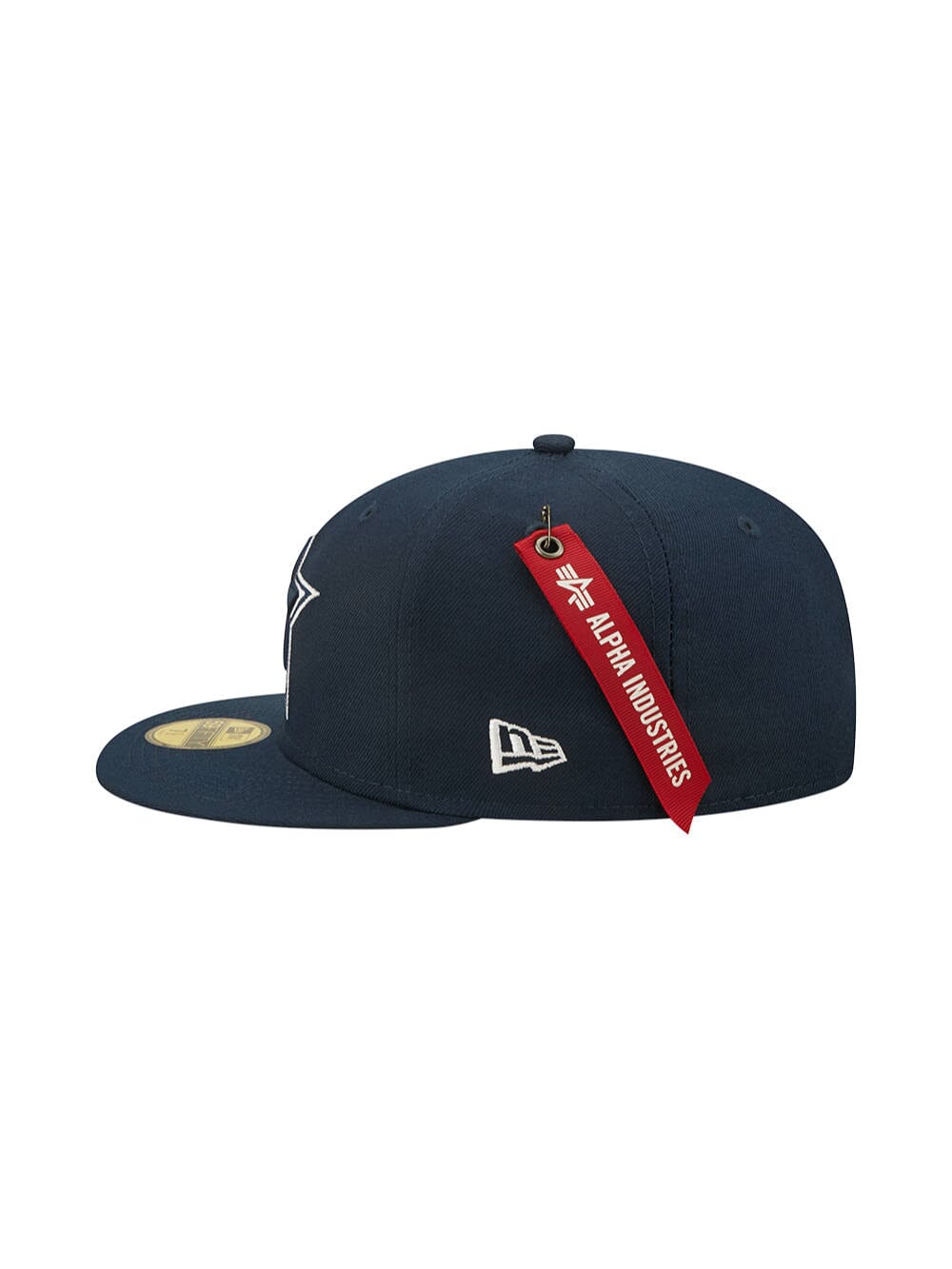 The Dallas Cowboys x Alpha x New Era 5950 Fitted Cap from Alpha Industries is a navy blue baseball cap in the team's colors, featuring a flat brim and a red Alpha Industries tag on the back.