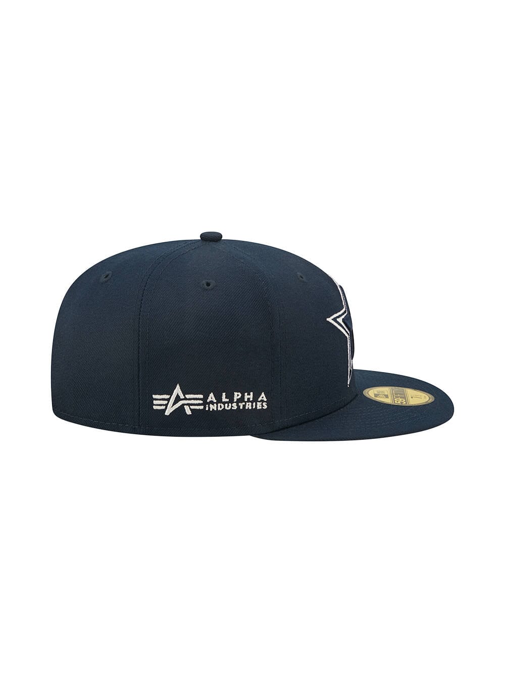 This Dallas Cowboys x Alpha x New Era 5950 Fitted Cap from Alpha Industries showcases a navy blue palette with a white star and logo. It features a flat brim and round crown, merging modern style with iconic branding reminiscent of the New Era team color 59FIFTY design.