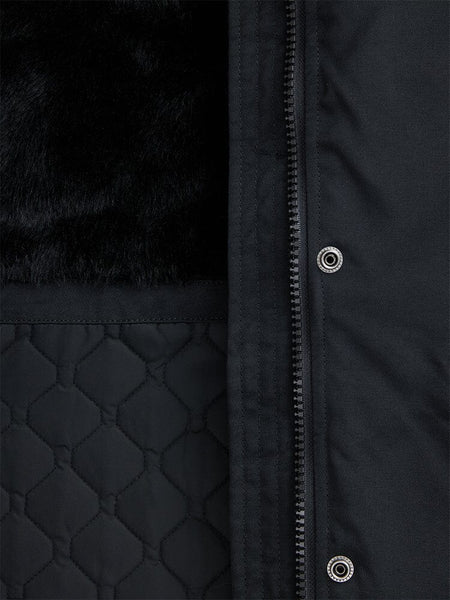 Close-up of the Elyse Gen II Parka W in black by Alpha Industries, highlighting a quilted pattern, faux fur lining, and a vertical zipper with metal snap buttons.