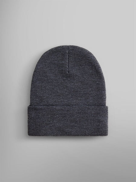 The Essential Beanie from Alpha Industries, Inc., featuring a paper label.