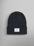 Essential Beanie by Alpha Industries in Dark Charcoal Heather with folded brim and rectangular Alpha paper label on front.
